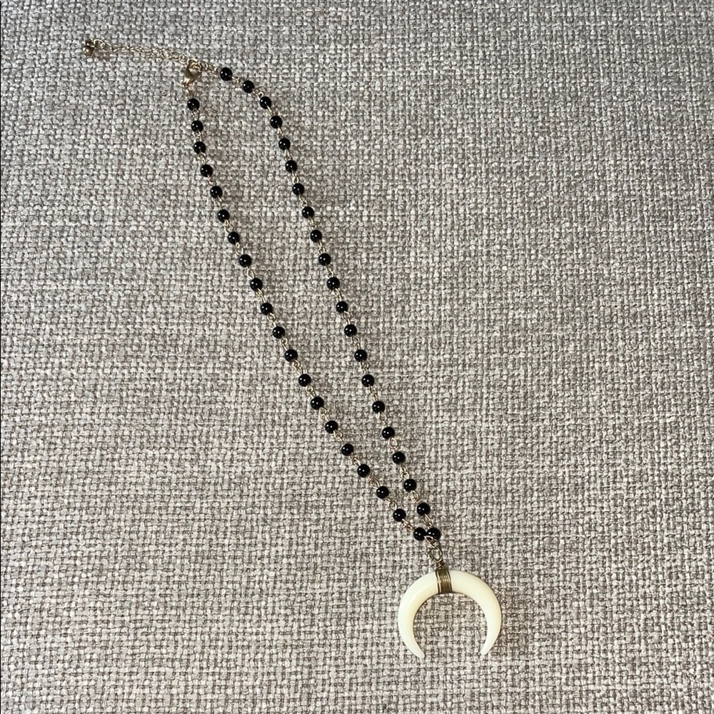 Elegant Black Beaded Necklace with Crescent Pendant